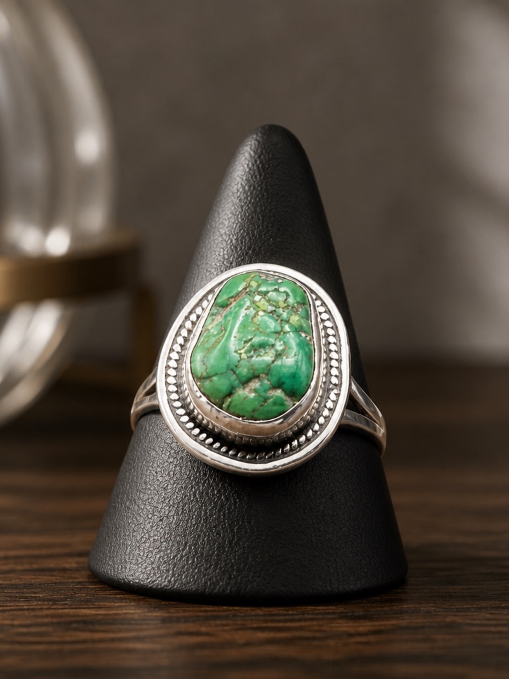 A Size 9 Turquoise stone in a Sterling Silver setting signed by H.Cortez